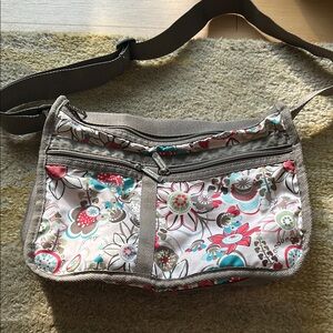 Lesportsac Gray and Pink Crossbody Bag with Floral Design